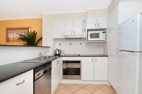 2 Bedroom Roof Top Apartment | Private kitchen | Full-size fridge, microwave, oven, stovetop