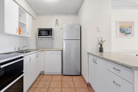 Full-size fridge, microwave, stovetop, coffee/tea maker