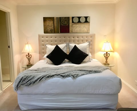 Jacaranda 1 Bedroom Suite | Egyptian cotton sheets, premium bedding, blackout drapes