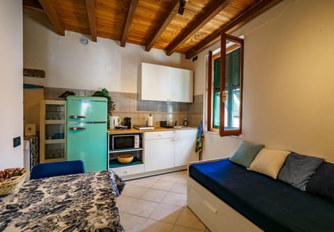 Exclusive Apartment | Private kitchen | Full-size fridge, microwave, stovetop, espresso maker