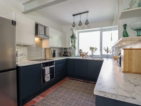 Fridge, electric kettle, toaster, cookware/dishes/utensils