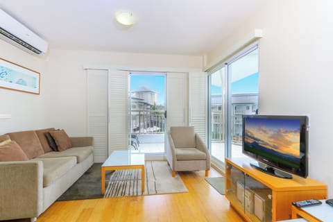 Apartment, 1 Bedroom, Partial Ocean View | Living area | Flat-screen TV