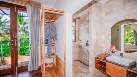 Presidential Villa | Bathroom | Designer toiletries, hair dryer, bathrobes, slippers