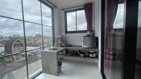 Apartment, 1 Bedroom | Minibar, in-room safe, desk, iron/ironing board