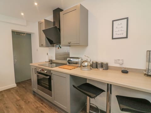 Fridge, electric kettle, toaster, cookware/dishes/utensils