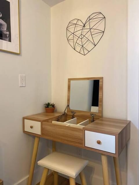 No need to hog the bathroom ladies - the master bedroom has it's own make-up station.