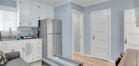 Cozy living space with a sofa sleeper (this is located in the kitchen)