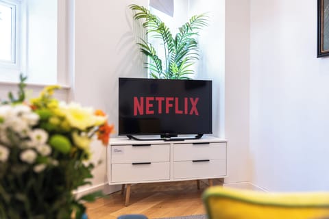 24-inch Smart TV with cable channels, Netflix, streaming services