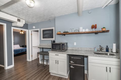 Condo, Multiple Beds | Private kitchen | Fridge, microwave, oven, stovetop