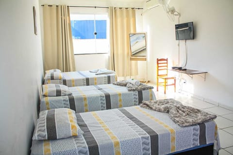 Standard Quadruple Room | Bathroom | Shower, towels, soap, toilet paper