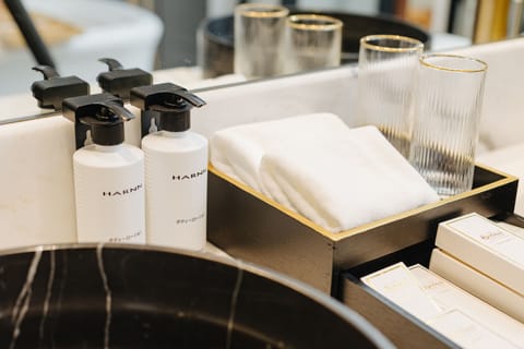 Junior Suite | Bathroom | Designer toiletries, hair dryer, bathrobes, slippers