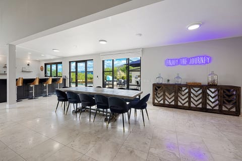 12-person dining area located near the bar & back patio