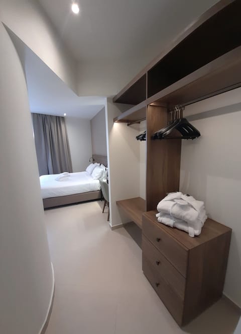 Deluxe Junior Suite | City View | In-room safe, desk, soundproofing, iron/ironing board