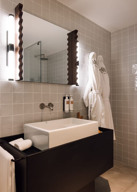 Suite, 2 Bedrooms | Bathroom | Shower, rainfall showerhead, designer toiletries, hair dryer