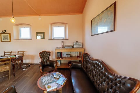 Superior Villa, Vineyard View | Living area | 30-inch flat-screen TV with satellite channels