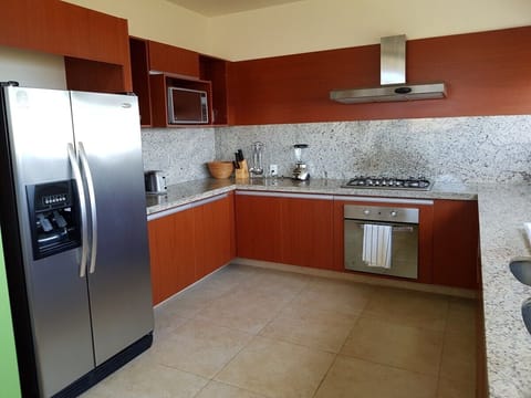 Apartment | Private kitchen | Fridge, microwave, coffee/tea maker, blender