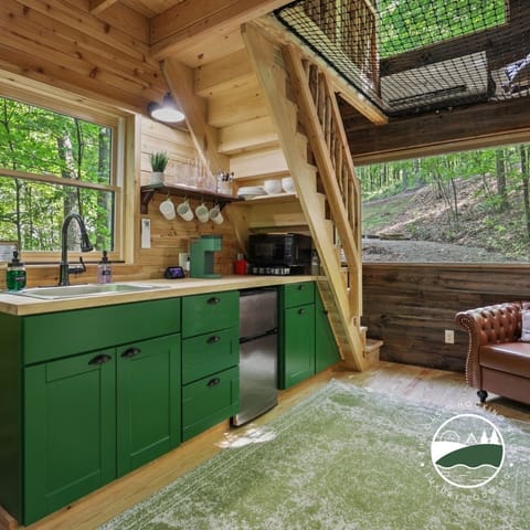 Your secluded getaway includes a similar eat-in kitchen design.