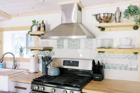 Fully stocked kitchen with all the supplies needed for cooking