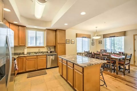 open kitchen with counter that seats 3