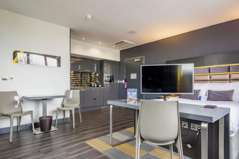 Family Studio | Living area | Flat-screen TV