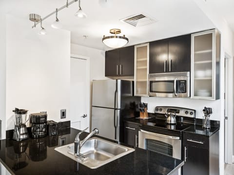 Apartment, 2 Bedrooms | Private kitchen | Full-size fridge, microwave, oven, stovetop