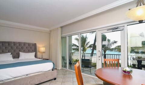 Junior Suite, Ocean View, Beachfront | In-room safe, desk, blackout drapes, iron/ironing board