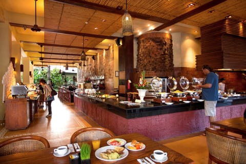 Daily buffet breakfast (USD 15 per person)