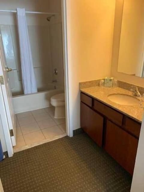 Two Double Bed Suite | Bathroom | Shower, hair dryer, towels