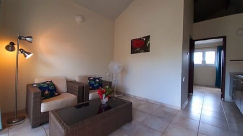 Apartment, 1 Bedroom | Living room | Flat-screen TV