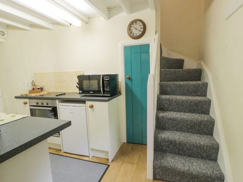 Fridge, electric kettle, toaster, cookware/dishes/utensils