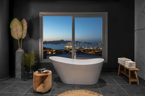 Suite, Terrace, Sea View (Sea View Infinity) | Bathroom | Shower, hair dryer, bathrobes, slippers