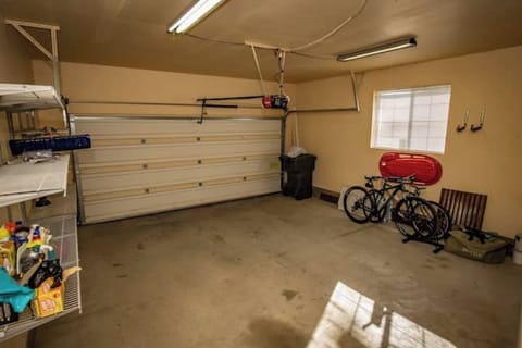2 Car Garage stores 2 mountain bikes and an inflatable kayak.