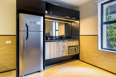 Apartment | Private kitchen | Full-size fridge, microwave, stovetop, cookware/dishes/utensils