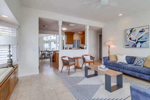 This living area is ideal for entertaining as it opens up to the kitchen.