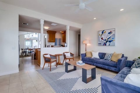 This living area is ideal for entertaining as it opens up to the kitchen.
