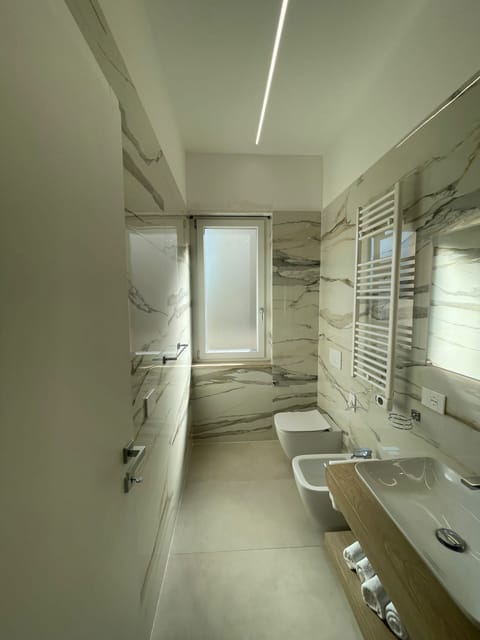 Exclusive Room | Bathroom | Rainfall showerhead, free toiletries, hair dryer, slippers