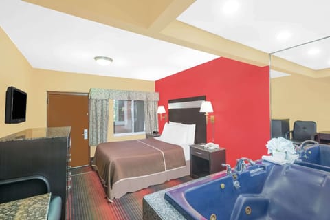 Studio Suite, 1 Queen Bed, Non Smoking | Desk, iron/ironing board, free cribs/infant beds, rollaway beds