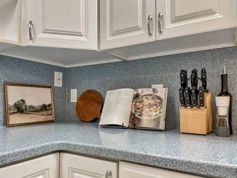 Tastefully decorated kitchen - try a recipe in the displayed cookbook!