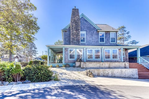A wall of windows brings in the light at the Sand Jam on the Oregon Coast