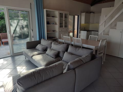 Living room with kitchen in far corner