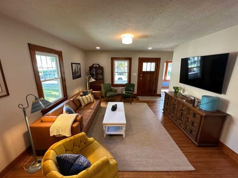 Living room situated for maximum comfort! Smart TV & cozy furniture featured!