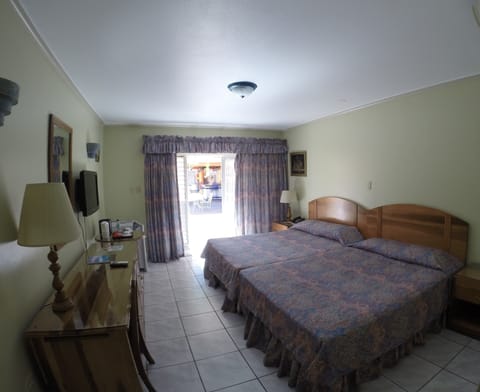 Superior Room, Pool View | 1 bedroom, in-room safe, desk, iron/ironing board