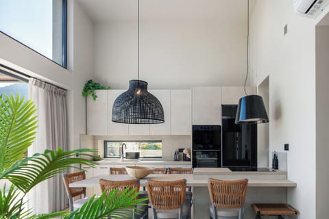 The fully equipped kitchen is a culinary dream, complete with high-quality appliances and everything you need to create a homemade meal.