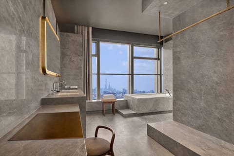 Presidential Penthouse, City View | Bathroom | Separate tub and shower, hair dryer, bathrobes, slippers