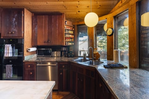 Spacious kitchen is fully equipped.