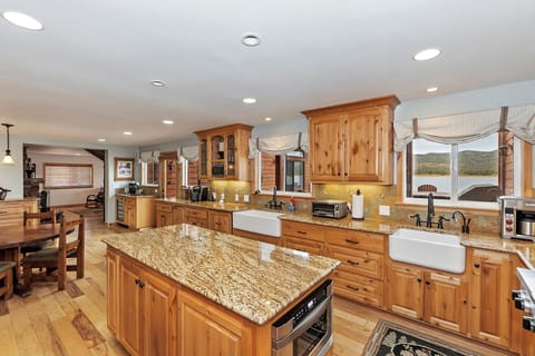 Kitchen features an island and modern appliances.