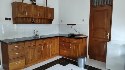 Deluxe Bungalow | Private kitchen | Fridge, electric kettle