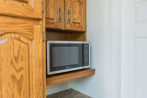 There is a microwave in the kitchen