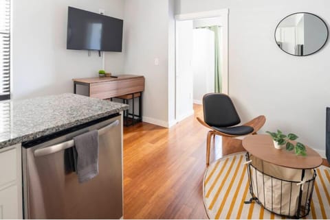 50in 4k Smart TV. Lounge in the comfortable arm chair, read a book. Multifunctional.