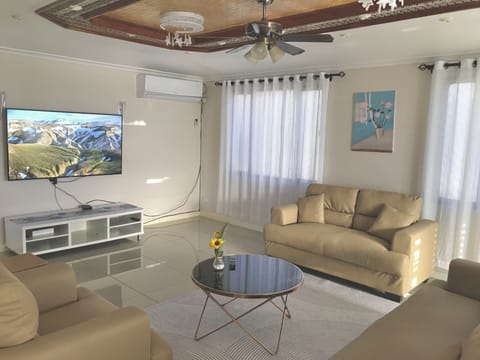 Executive Condo | Living area | 42-inch LCD TV with digital channels